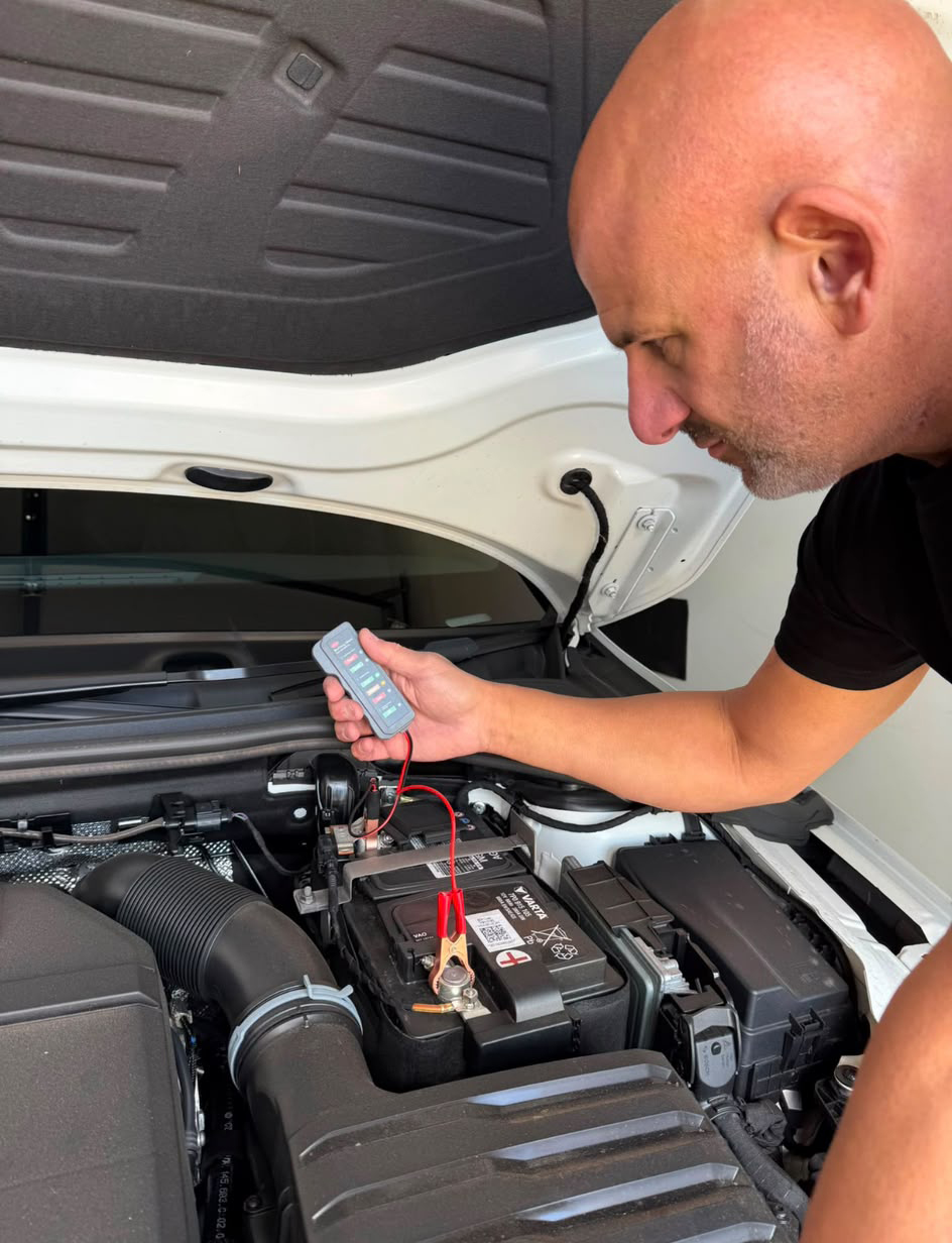 Battery health tester connected to a vehicle battery